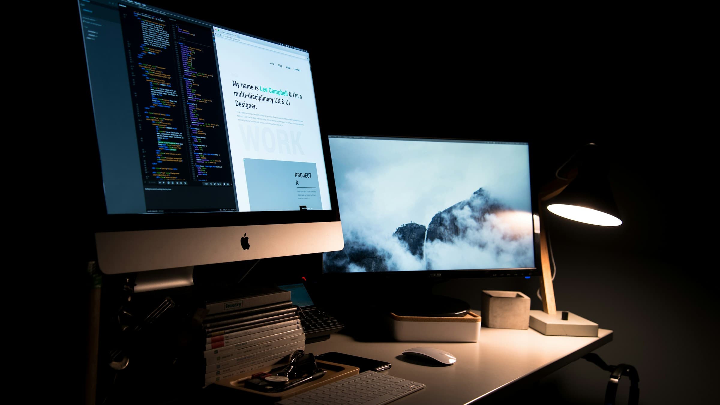 A developer workspace with code and designs across dual monitors.